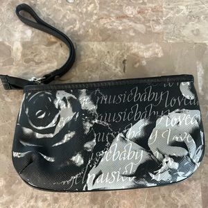 L.A.M.B beautiful wristlet looks new signature lining , leather wrist strap